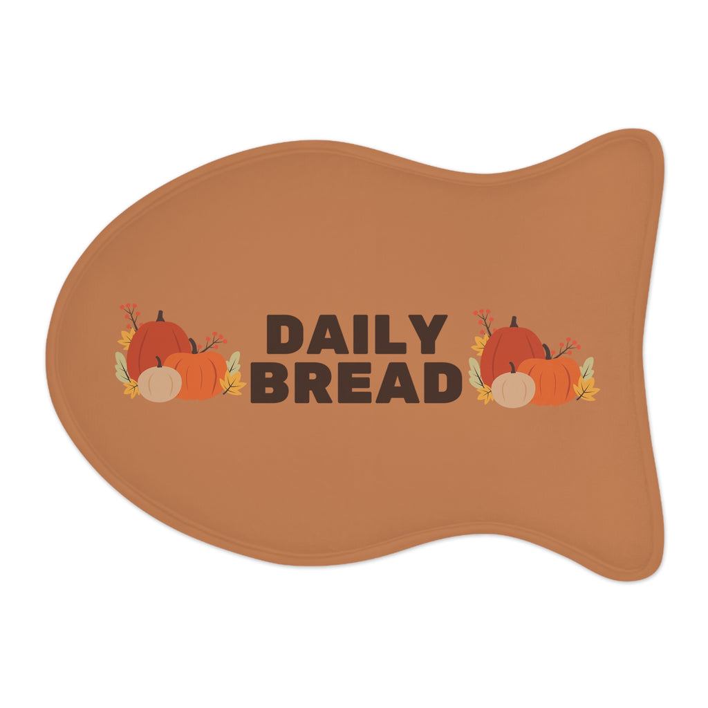 Flat lay of a Fall Harvest Pumpkin pet food mat with colorful leaves and pumpkin design.