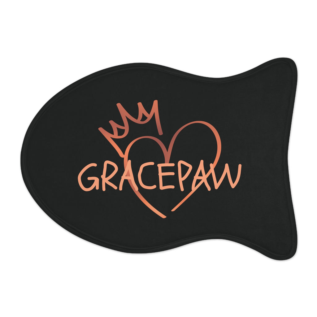 Black fish-shaped pet feeding mat with a heart and crown graphic and the word “GRACEPAW” in peach lettering, designed for comfort and non-slip functionality.