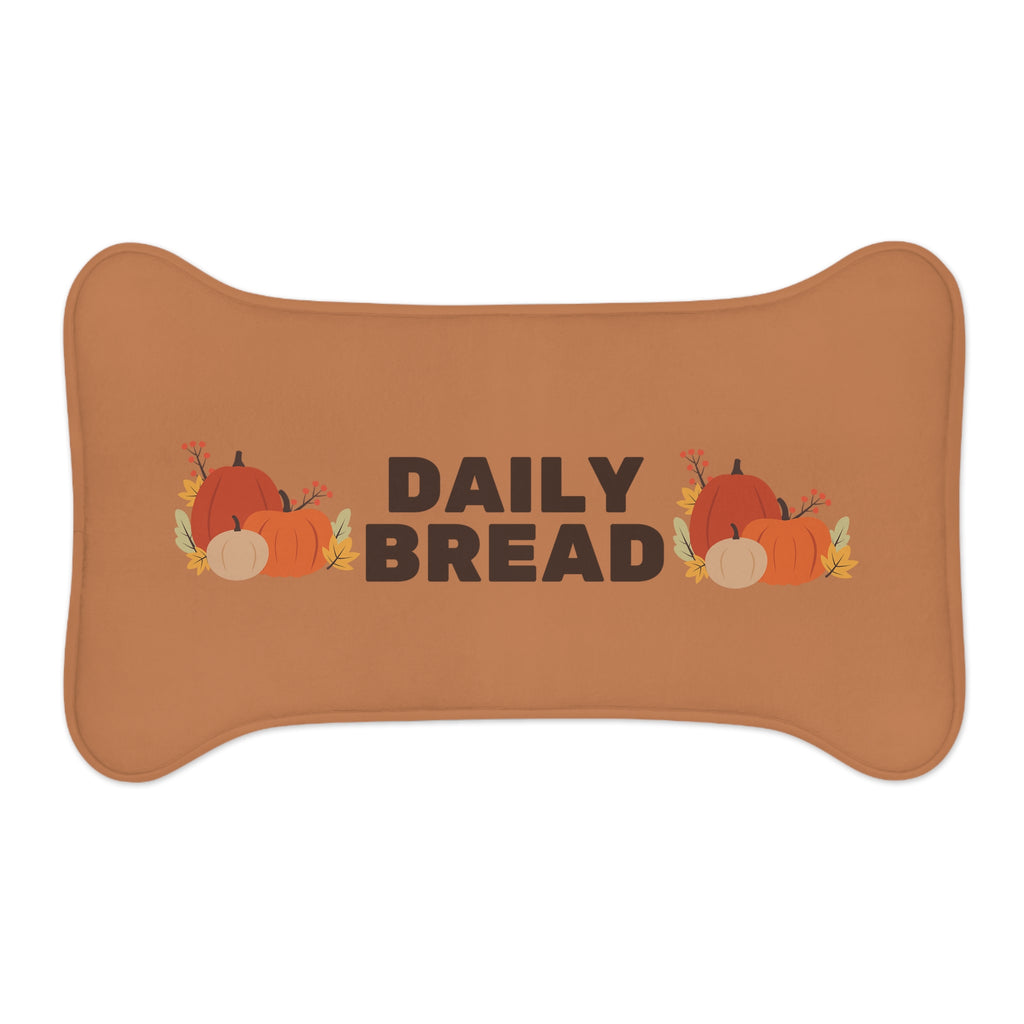 Flat lay of a Fall Harvest Pumpkin pet food mat with colorful leaves and pumpkin design.