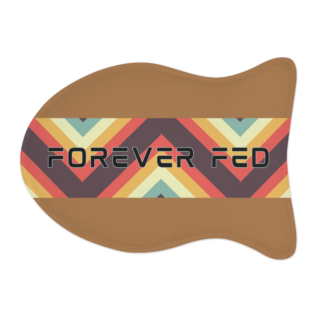 Flat view of caramel colored pet food mat with bold black text “Forever Fed” and colorful diagonal stripe design.