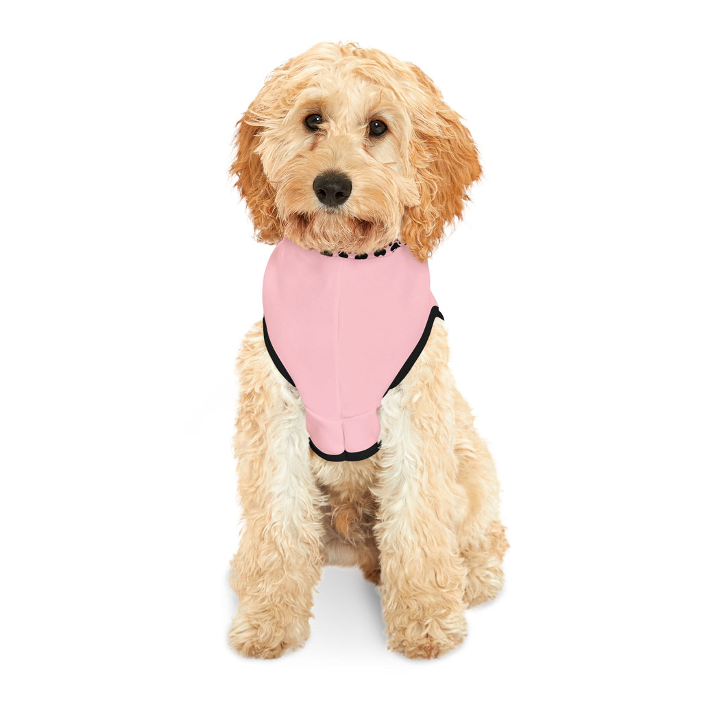 Soft pink pet hoodie with  the word, "JESUS" in large font and small white paw prints on the hood.