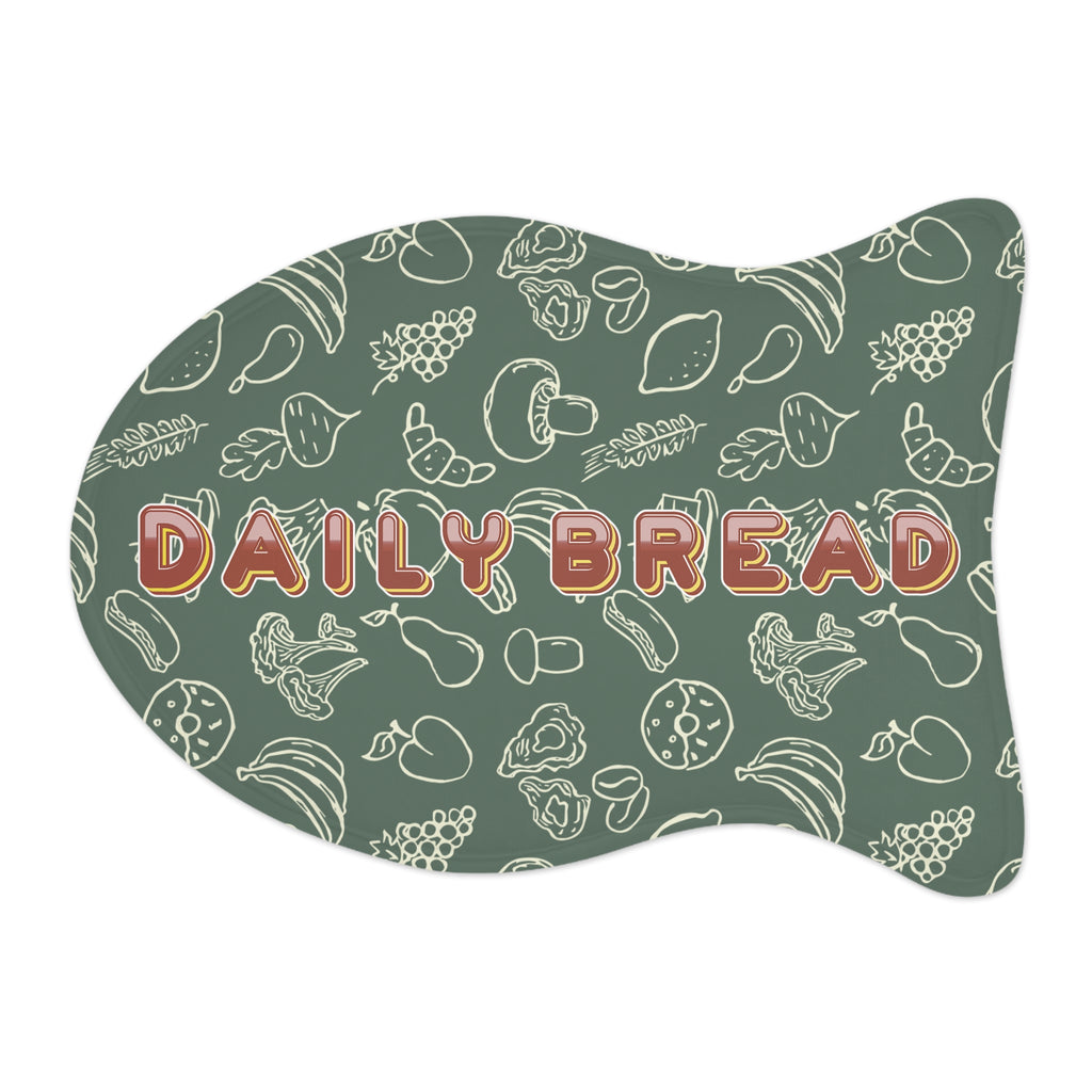 Sage green pet feeding mat with white food-themed doodle pattern, fish shape, non-slip backing.