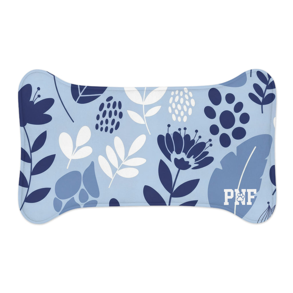 Blue floral feeding mat with the PNF logo in white on the bottom corner. 