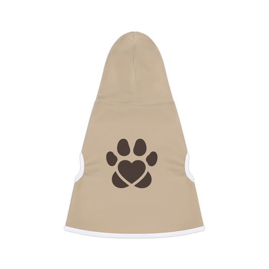 Beige pet coat with a black paw print design on a white background