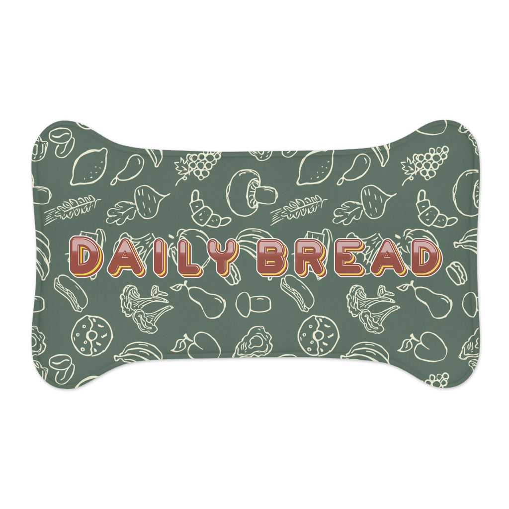 Sage green pet feeding mat with white food-themed doodle pattern, bone shape, non-slip backing.