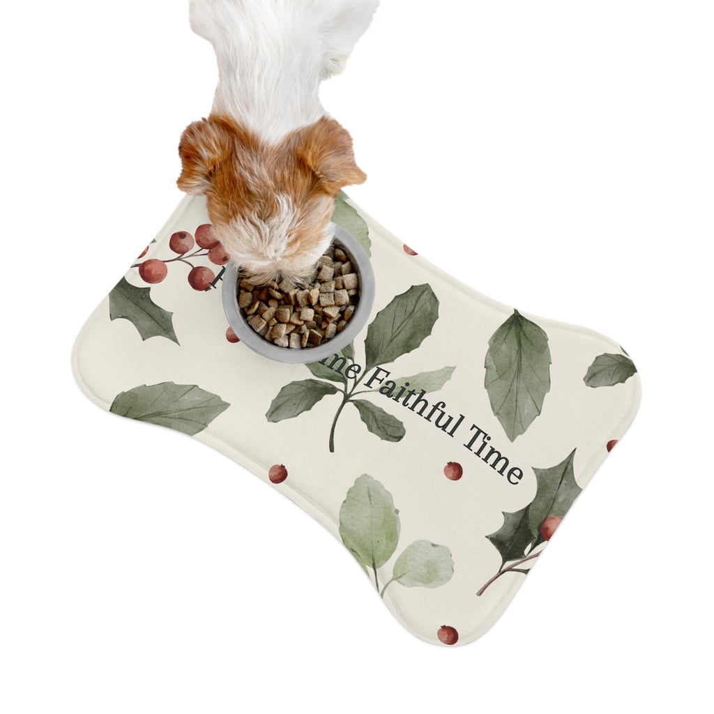 Bone‑shaped plush pet feeding mat in dark purple with gold heart‑of‑paw‑prints graphic and text “Risen Love Renewed Paw”