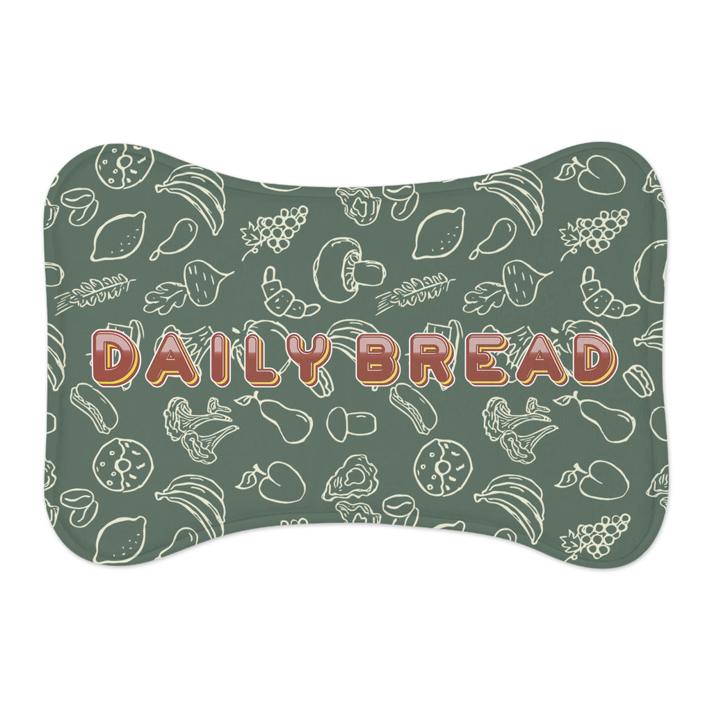 Sage green pet feeding mat with white food-themed doodle pattern, bone shape, non-slip backing.
