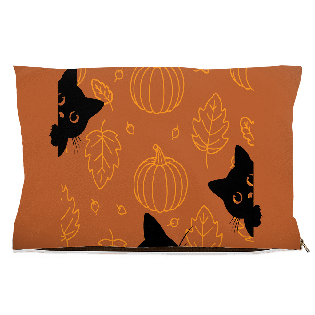 Fall-themed dog and cat bed with black cat faces, pumpkins, and autumn leaves on orange background