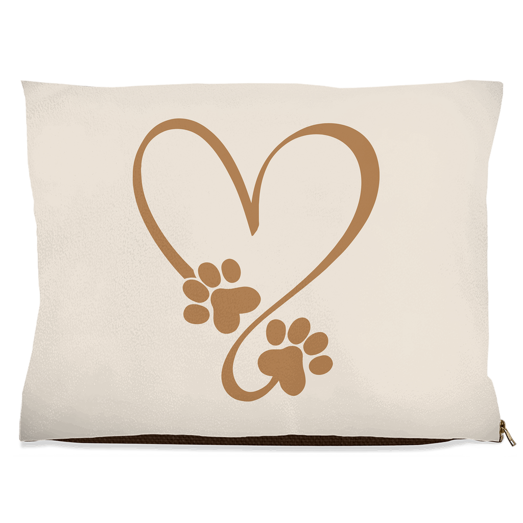 Beige pillow with a brown heart design made of paw prints on a beige background