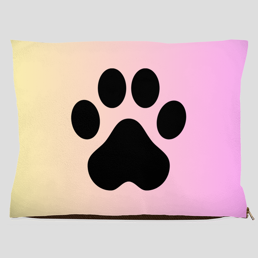 Pet bed with black paw print on pastel cream to pink gradient background