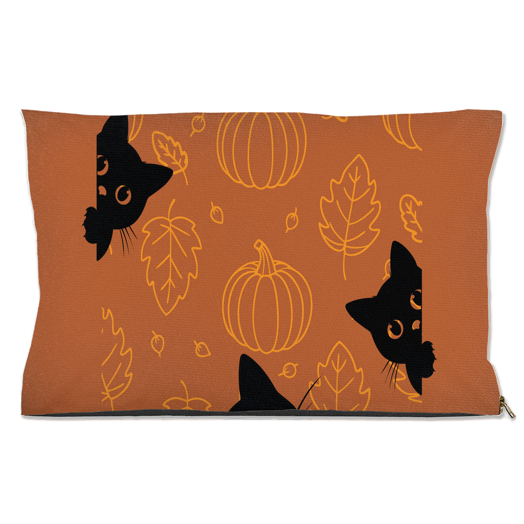 Fall-themed dog and cat bed with black cat faces, pumpkins, and autumn leaves on orange background