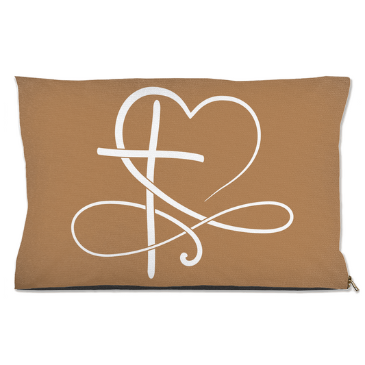 Tan pet pillow with a white heart and line design on a white background