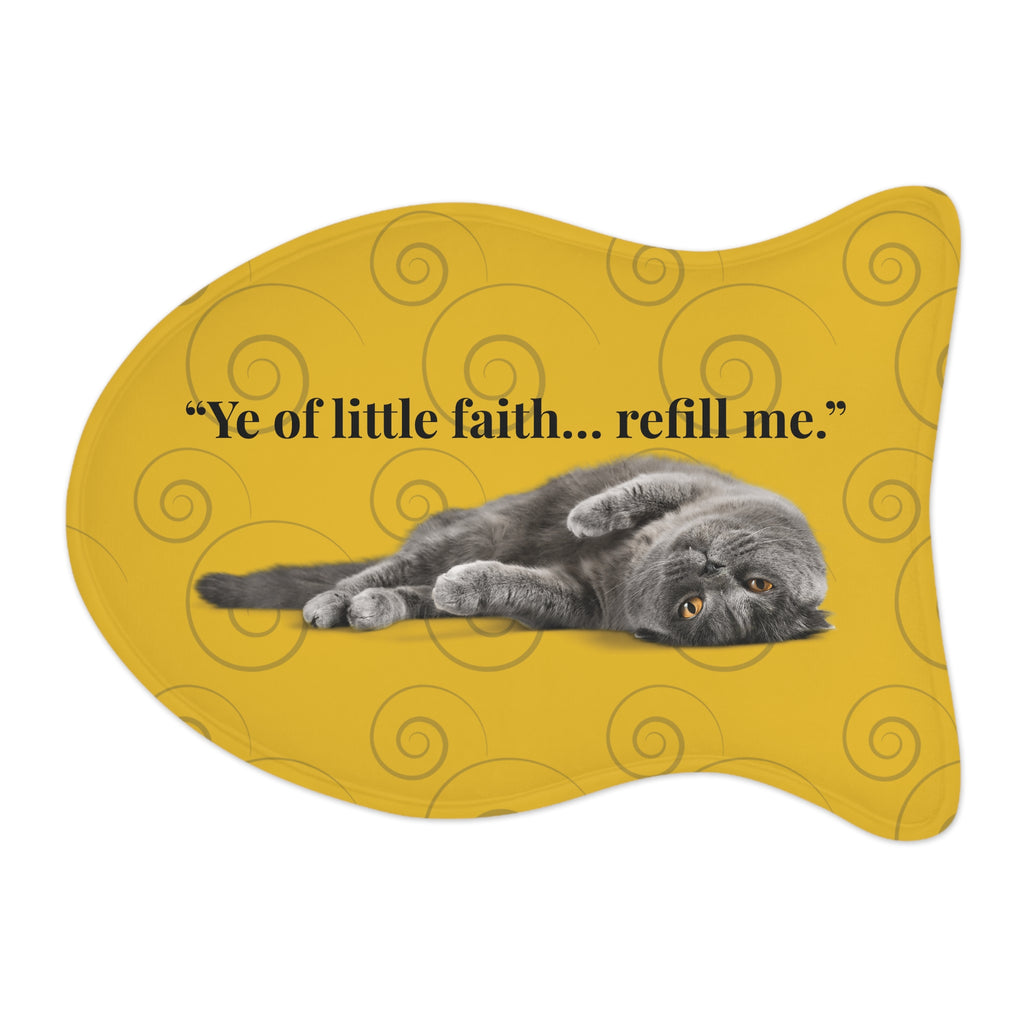 Yellow fish-shaped pet feeding mat with lounging gray cat and the phrase “Ye of little faith… refill me,” decorative swirl background.