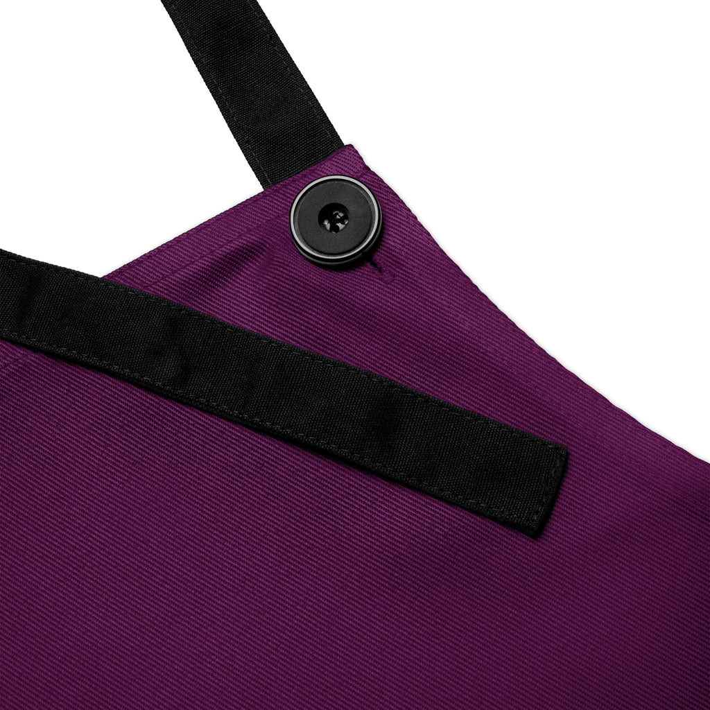 Purple apron featuring the word “LOVE” in gold lettering, with a golden paw print replacing the “O,” symbolizing love for pets and faith in a sleek, elegant design.