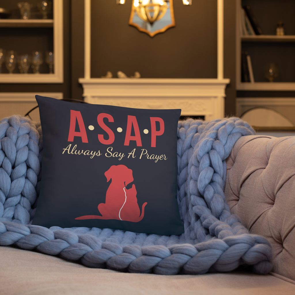 Charcoal blue accent pillow with the wording, " ASAP, Always Say a Prayer" in red and yellow lettering with two pet silhouettes.
