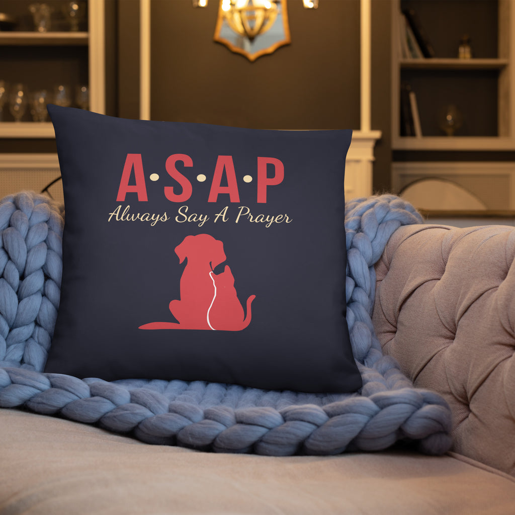 Charcoal blue accent pillow with the wording, " ASAP, Always Say a Prayer" in red and yellow lettering with two pet silhouettes.