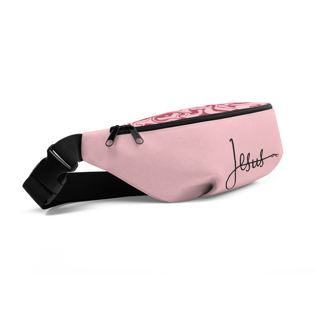 Pink fanny pack featuring the word ‘Jesus’ in black cursive with a leash-style design, faith-inspired accessory