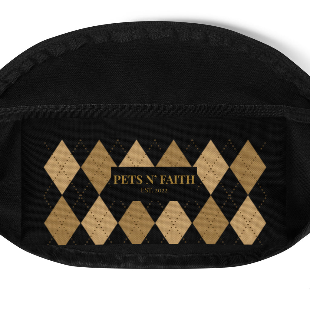 Inside view of black GRACE fanny pack with gold and black argyle diamond pattern and “PETS N’ FAITH EST. 2022” text.