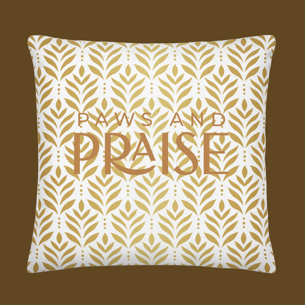White premium pillow with golden leaf pattern and text reading ‘Paws and Praise,’ Christian pet lover decor by Pets N’ Faith