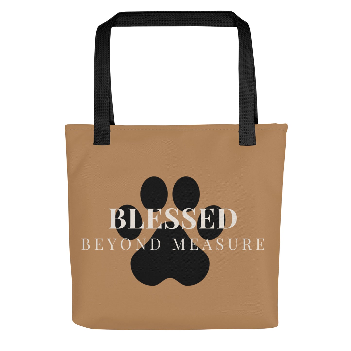 Brown tote bag with black paw print and 'Blessed Beyond Measure' text on a white background