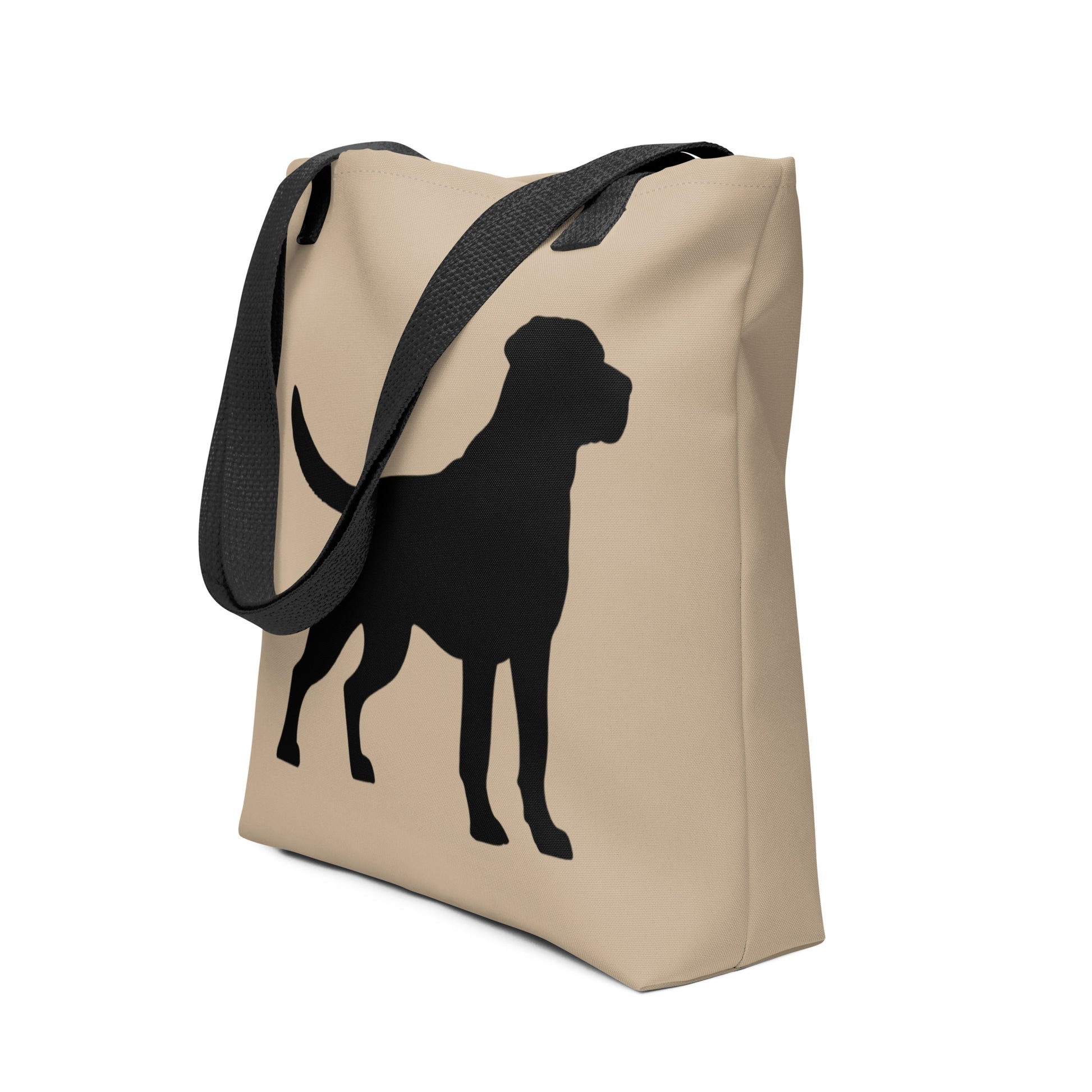 Beige tote bag with black dog silhouette on a white background