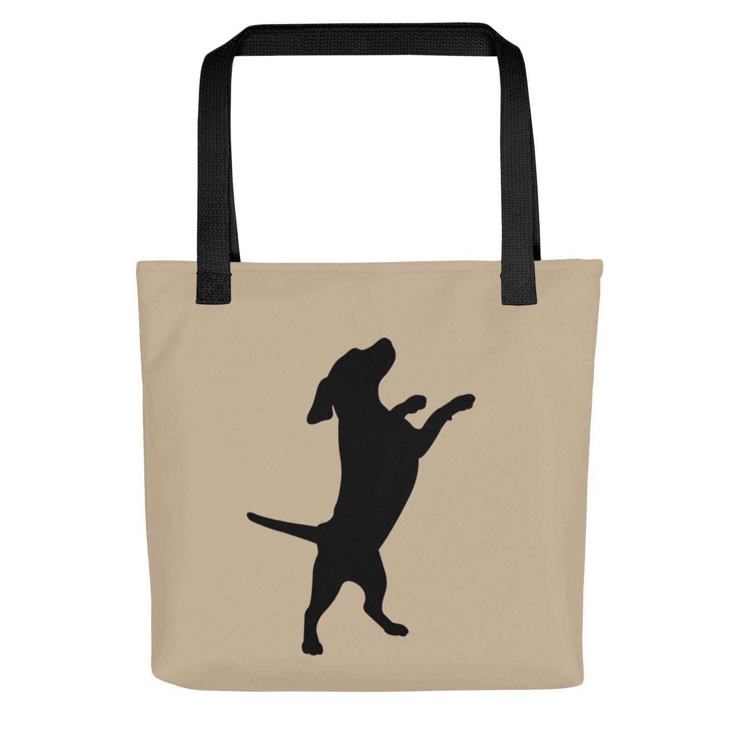 Beige tote bag with black dog silhouette and black handles on a white background