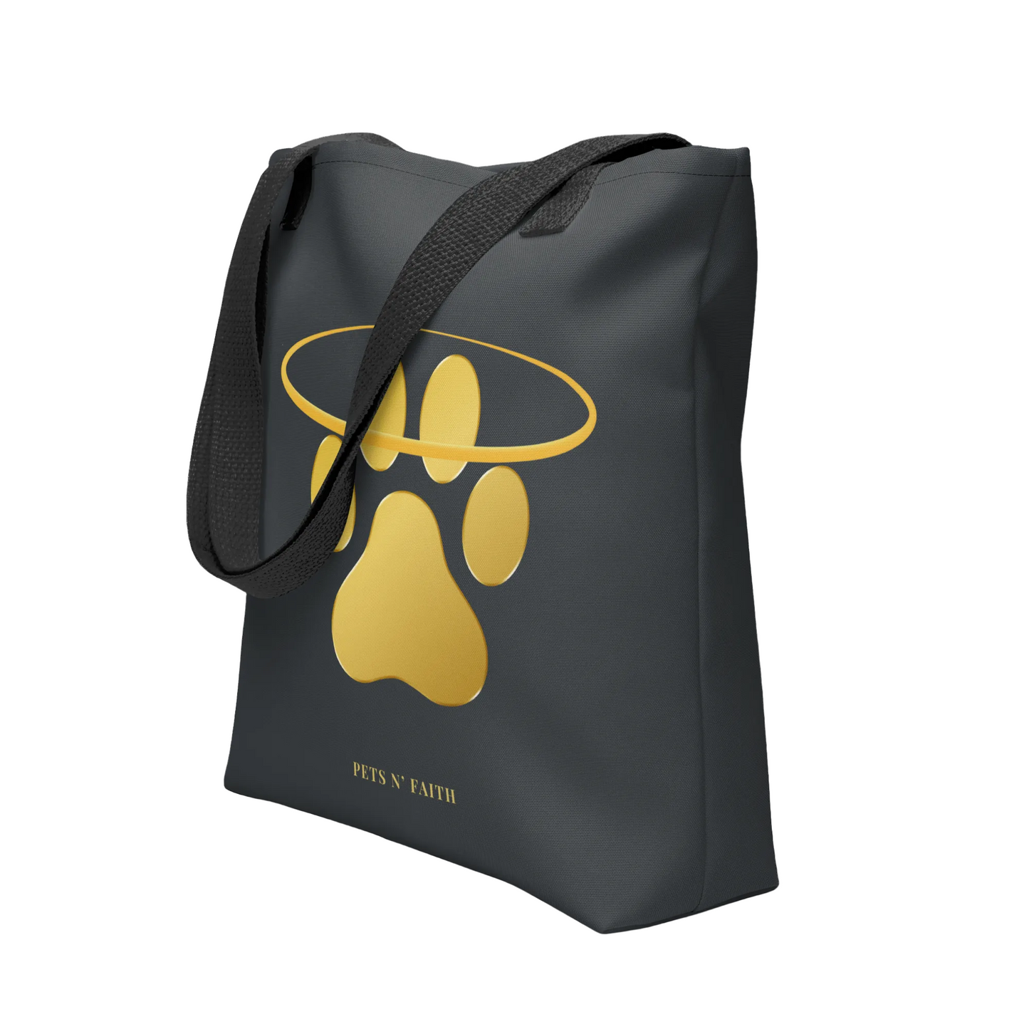 Dark grey tote bag with gold paw print design and 'Paws N' Faith' text on a white background