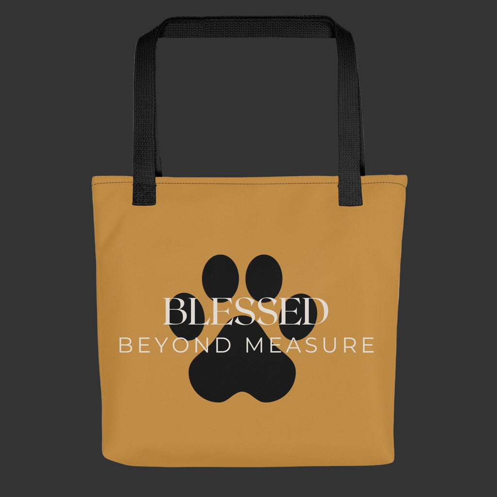 Caramel Tote Bag with the words, " Blessed Beyond Measure" with a large paw print adorning the tote bag. 