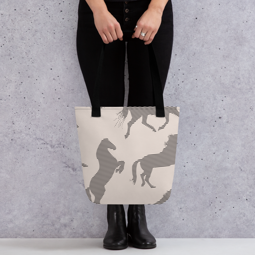 Taupe colored tote bag with a horse pattern on top.