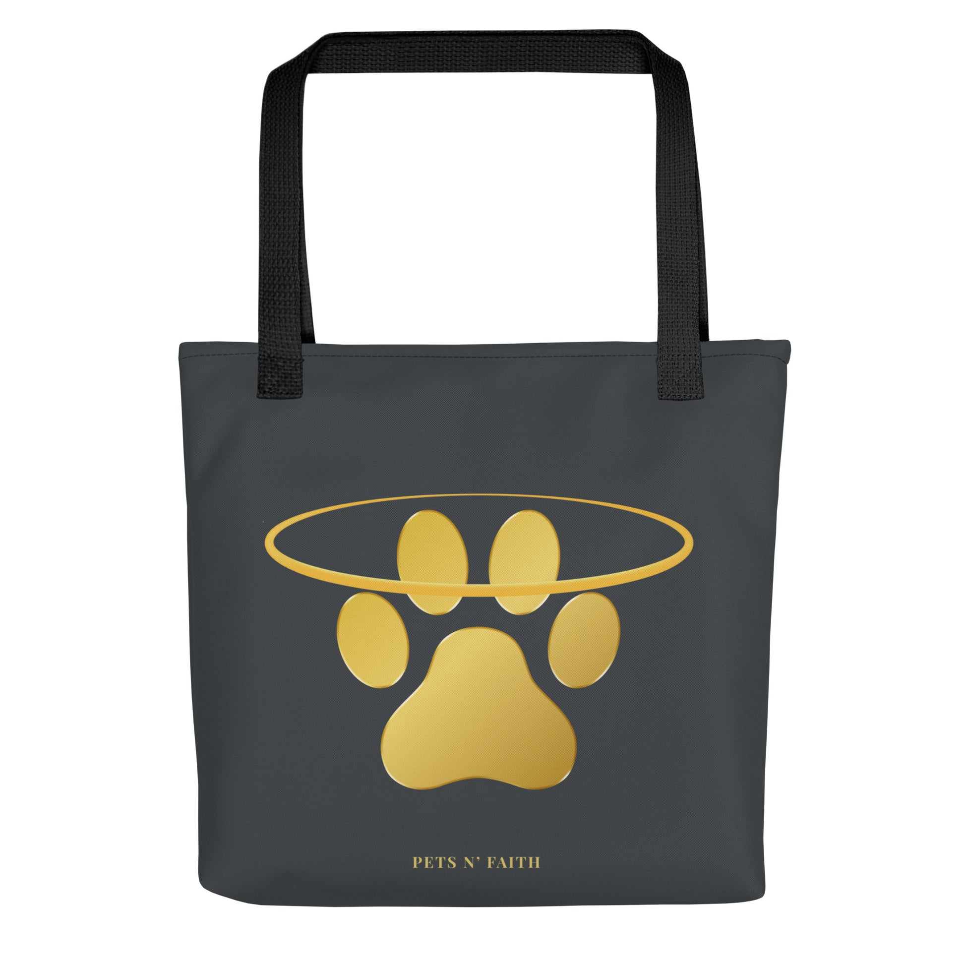 Dark grey tote bag with gold paw print design and 'PETS N' FAITH' text on a white background