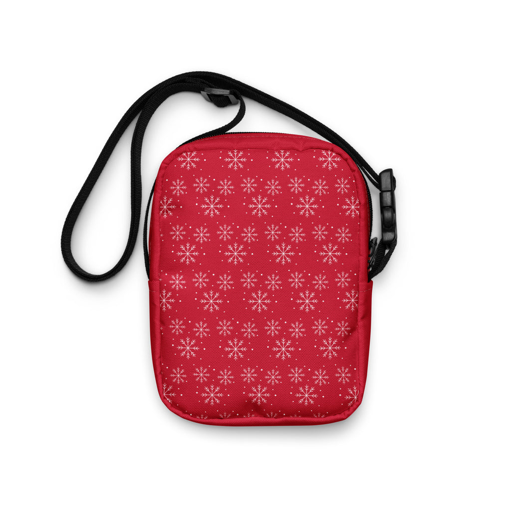 Crossbody bag featuring a white snowflake pattern, festive holiday design