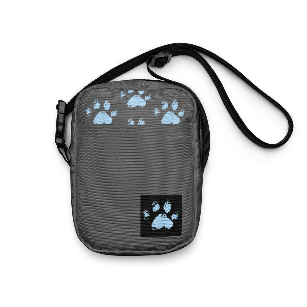 Gray crossbody bag with repeating blue paw print pattern, faith-inspired pet accessory