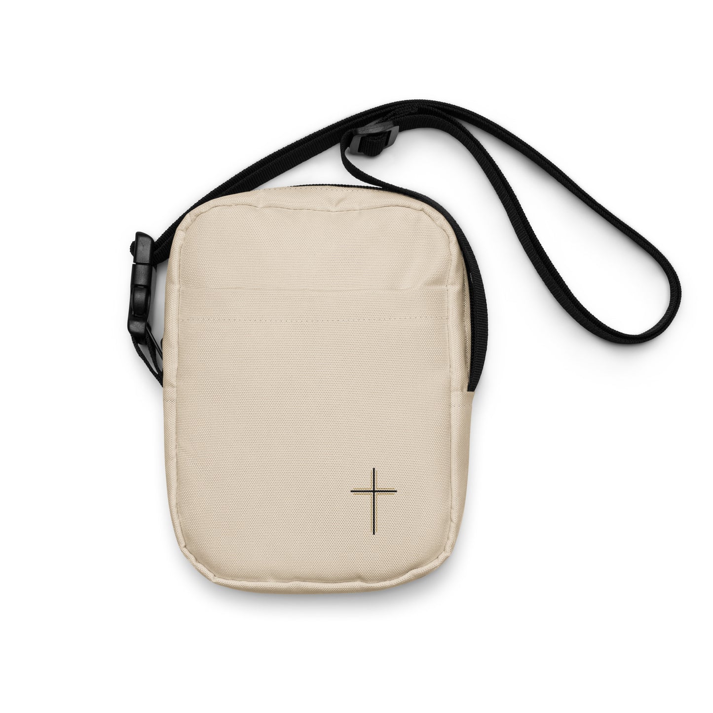 Beige crossbody bag with a black cross on a white background