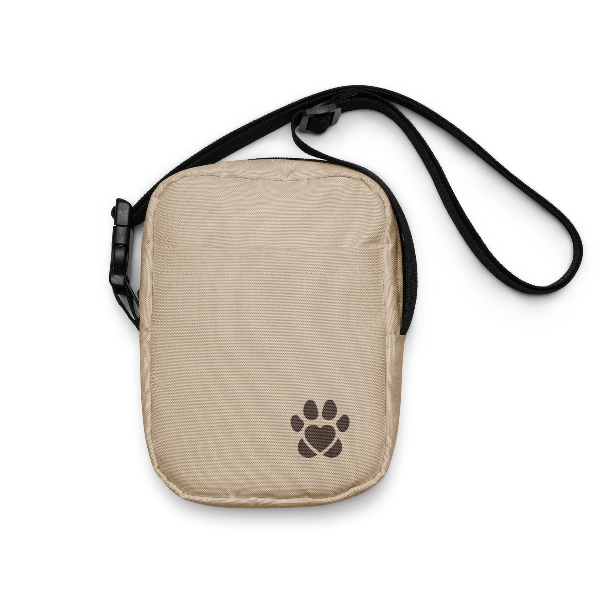 Beige crossbody bag with a brown paw print design on a white background