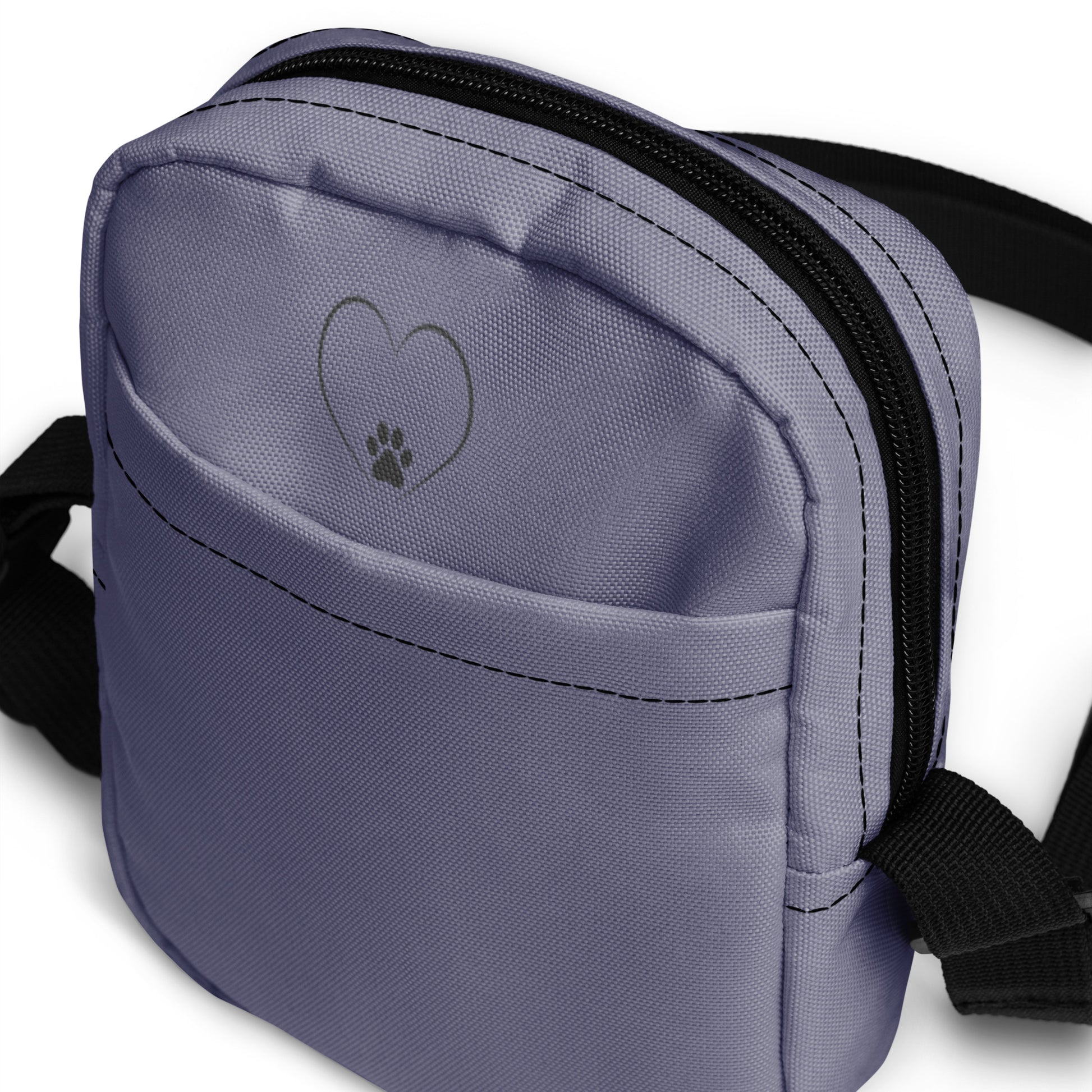 Gray bag with a heart and paw print design on a white background
