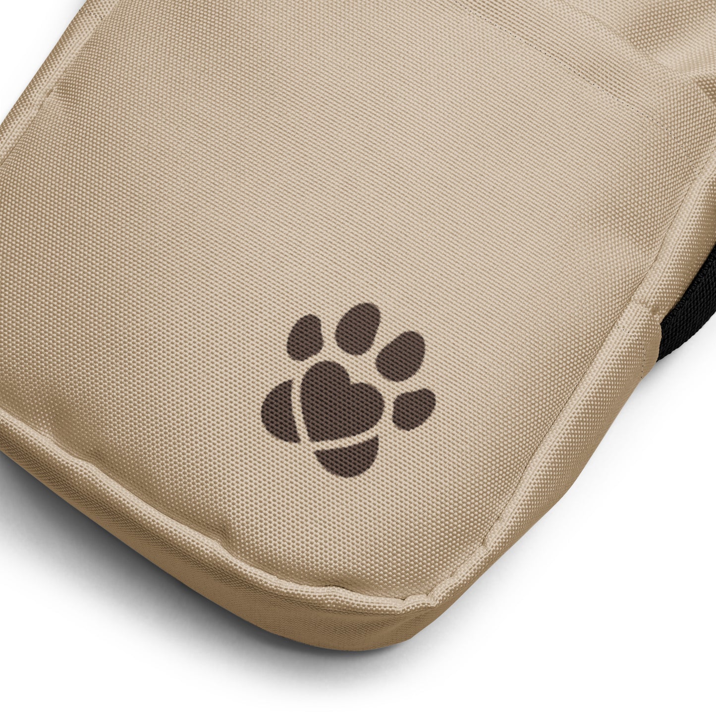 Beige pouch with a brown paw print design on a white background
