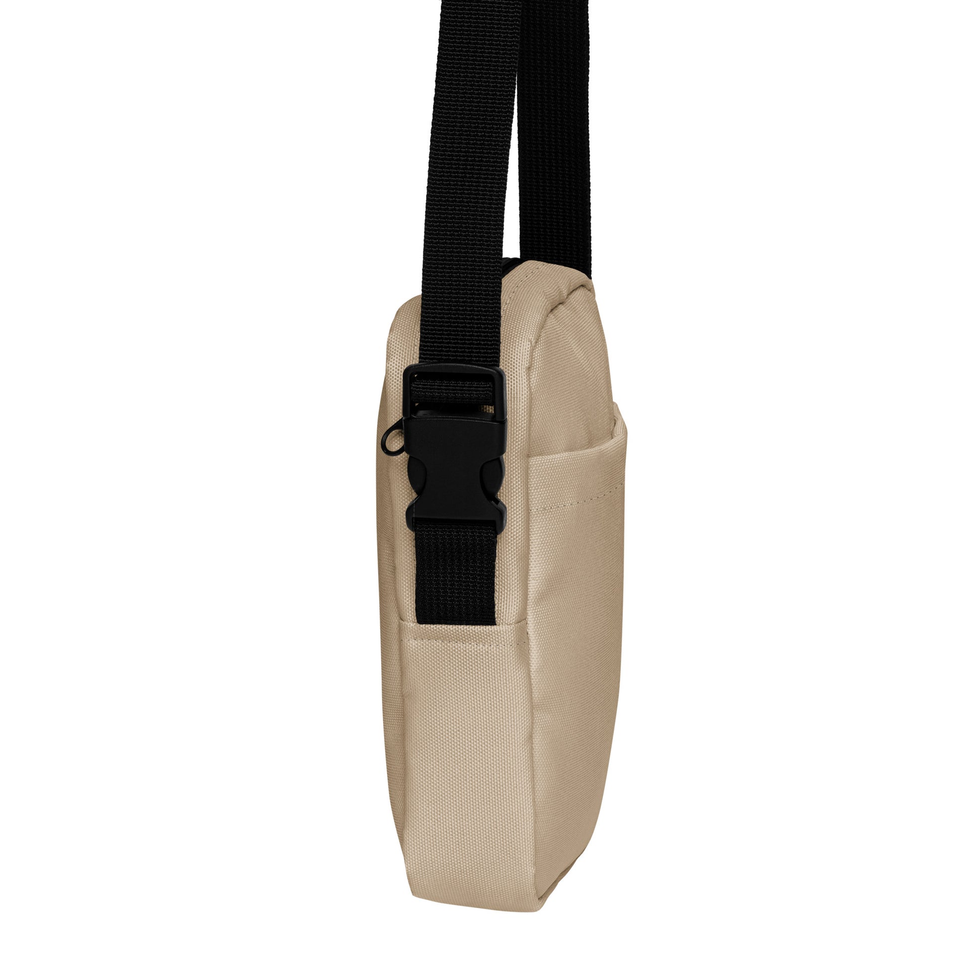 Beige crossbody bag with a brown strap on a white background