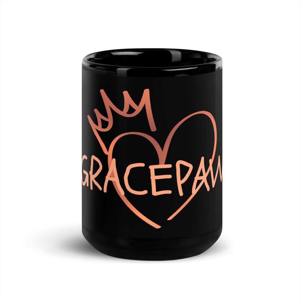 Black glossy ceramic mug with the word “Gracepaw” in rose-gold lettering and a heart-and-crown design — symbolizing faith, love, and the bond between pets and their owners.