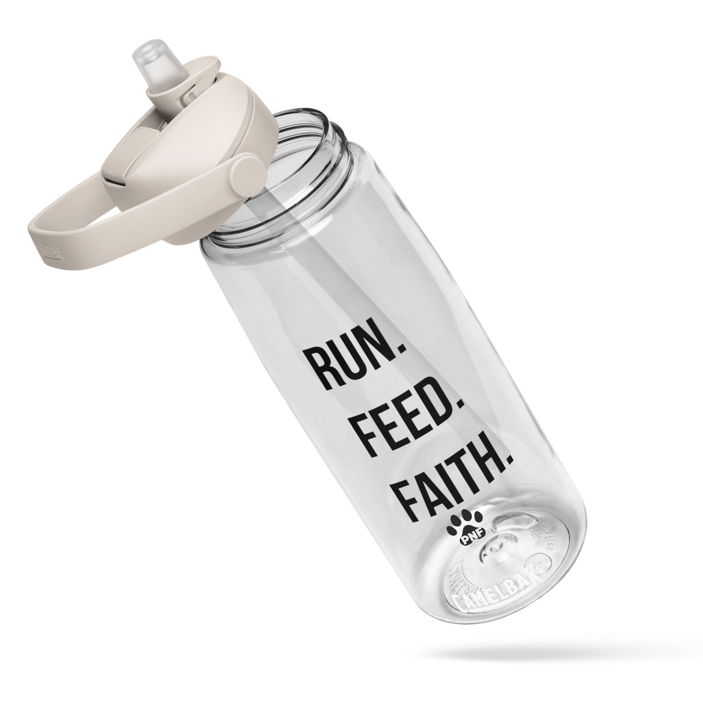Front view of the clear CamelBak® water bottle showing "Run. Feed. Faith." in black text.