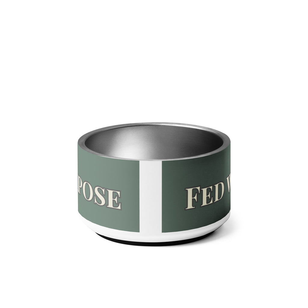 Close-up of back view of white stainless steel pet bowl with the saying, " Fed with Love and Purpose". 