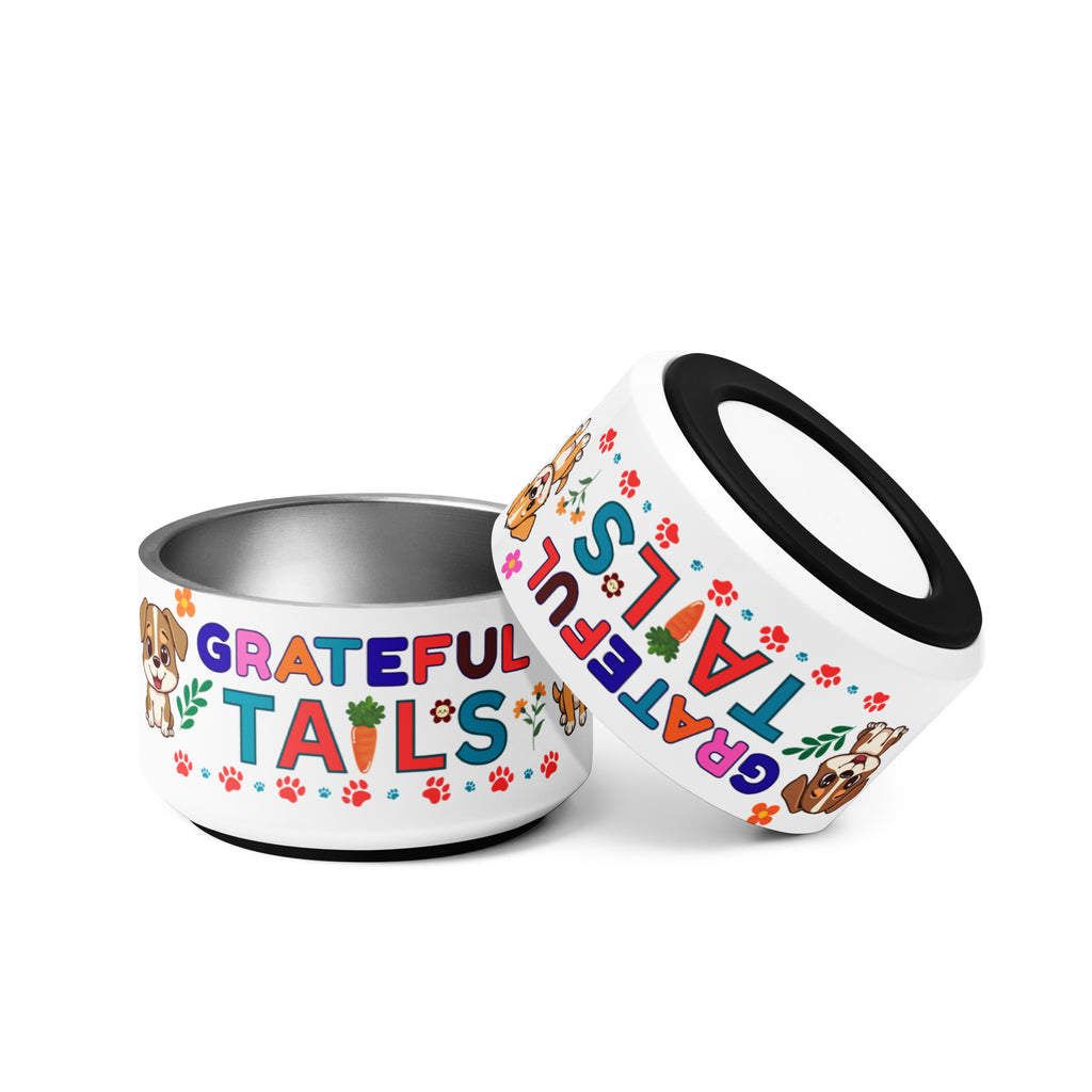 Two stainless steel pet bowls with colorful “Grateful Tails” design featuring cartoon dogs, paw prints, flowers, and a carrot.