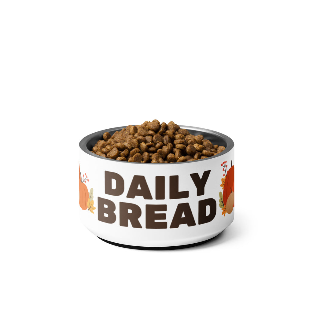 Daily Bread pet bowl with autumn leaves and pumpkin design, filled with dog kibble.