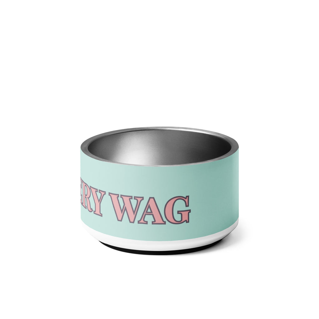 Mint green pet bowls stacked on top of each other with pink and black text reading “Joy in Every Wag,” featuring a durable stainless steel interior and anti-slip rubber base.