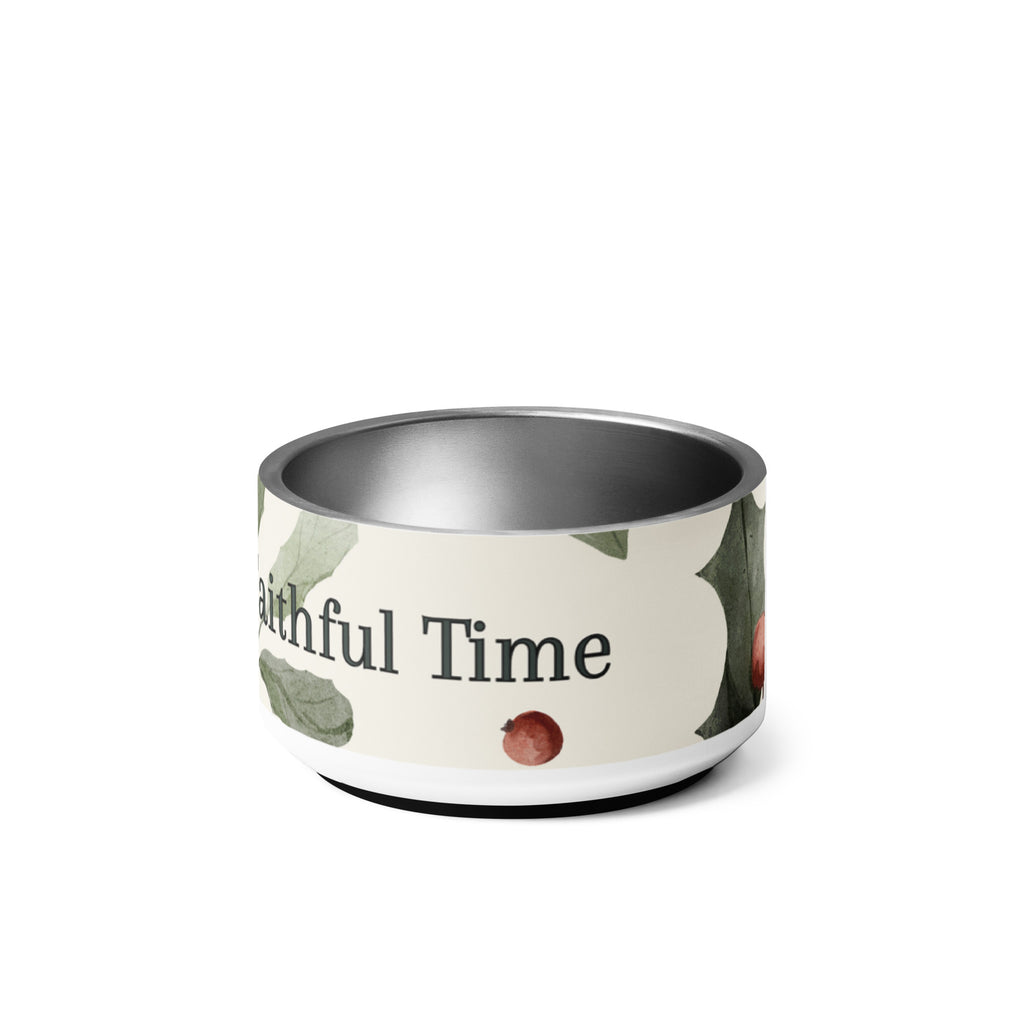 Stainless steel pet bowl with cream exterior and green leaf botanical pattern, text “Feeding Time, Faithful Time” around the rim, anti‑slip base visible