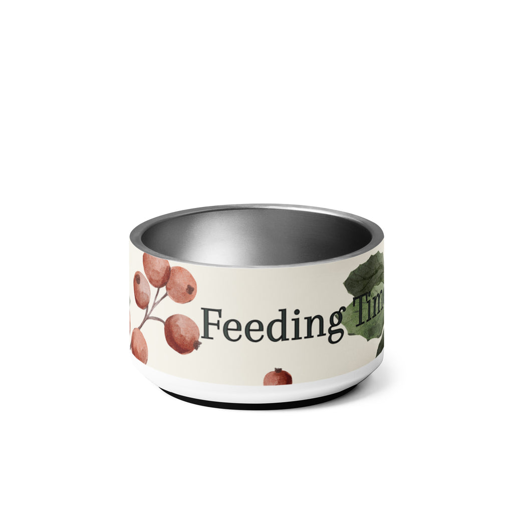 Stainless steel pet bowl with cream exterior and green leaf botanical pattern, text “Feeding Time, Faithful Time” around the rim, anti‑slip base visible