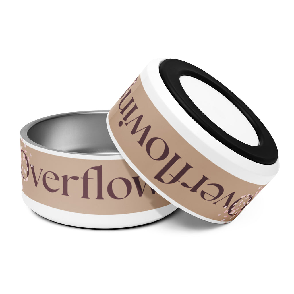 Close-up of two white stainless steel pet bowls stacked with the words, “Overflowing” in the front and a rose petal design adorned on the sides.