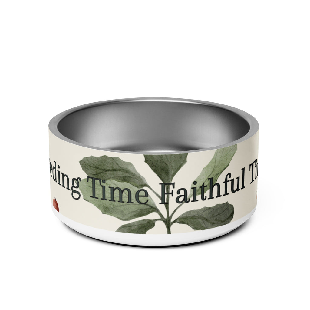 Stainless steel pet bowl with cream exterior and green leaf botanical pattern, text “Feeding Time, Faithful Time” around the rim, anti‑slip base visible