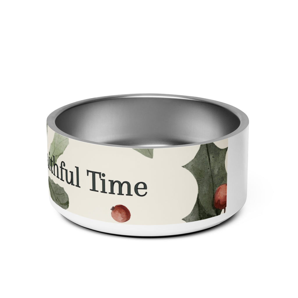 Stainless steel pet bowl with cream exterior and green leaf botanical pattern, text “Feeding Time, Faithful Time” around the rim, anti‑slip base visible