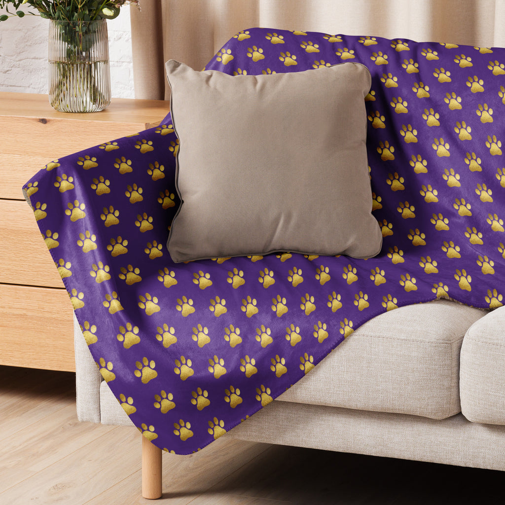 Indigo sherpa blanket with gold paw print design for Pets N' Faith
