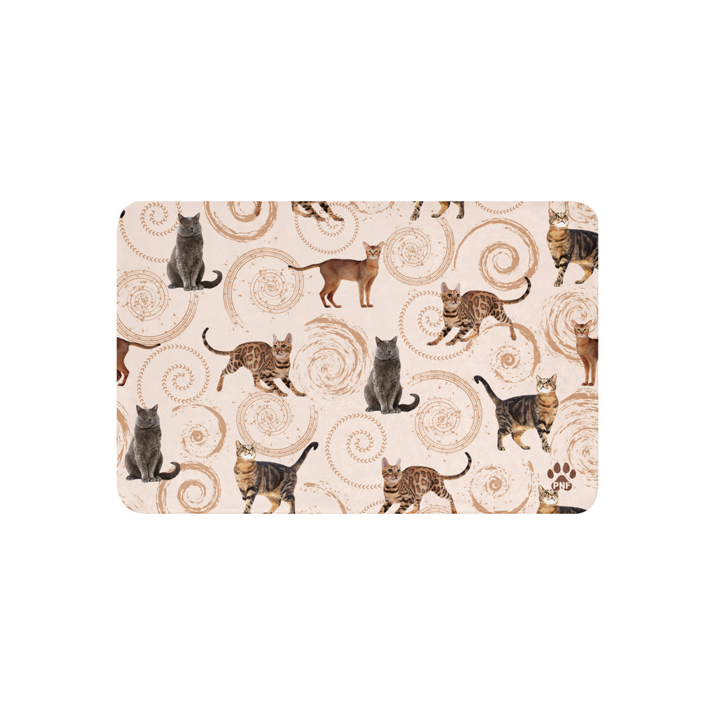 Cream sherpa blanket featuring illustrated cats in gray, brown, and tabby patterns surrounded by spiral swirls, luxury cat lover home décor by Pets N’ Faith.